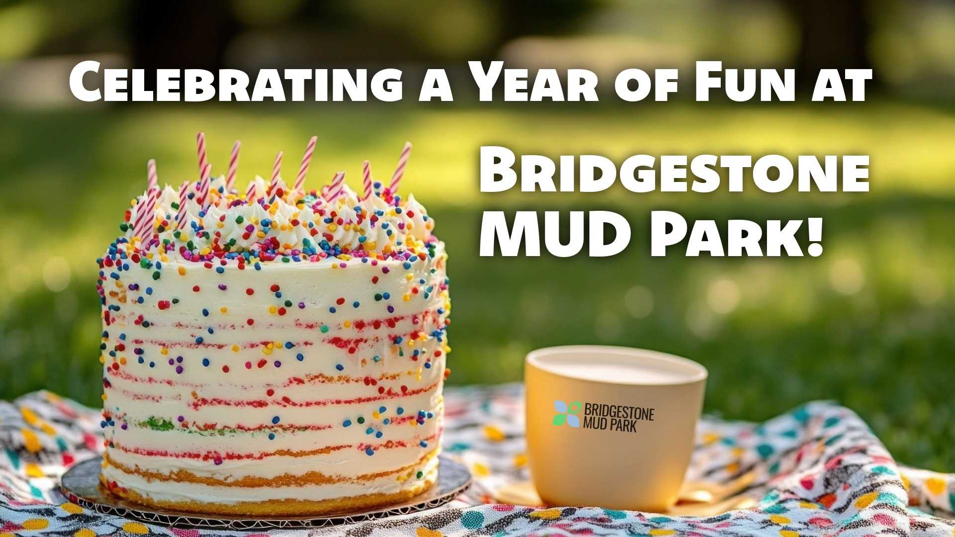 Iced cake with confetti sprinkles and birthday candles.